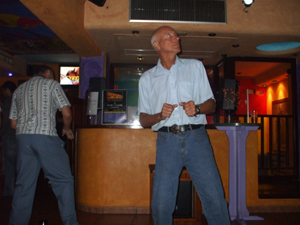 old guys dancing at the Highlander in Ibiza